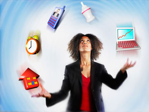 Woman in a blazer juggling things including house, phone, clock, laptop and baby bottle.
