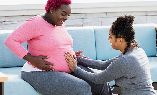 Pregnant woman and doula