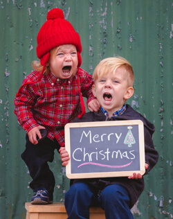 kids taking Christmas picture