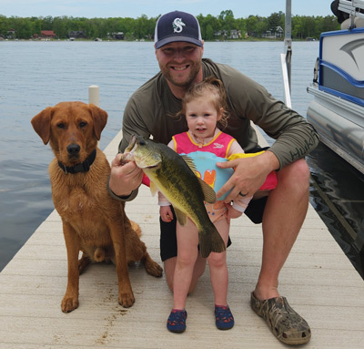 Tim Burns and daughter fishing