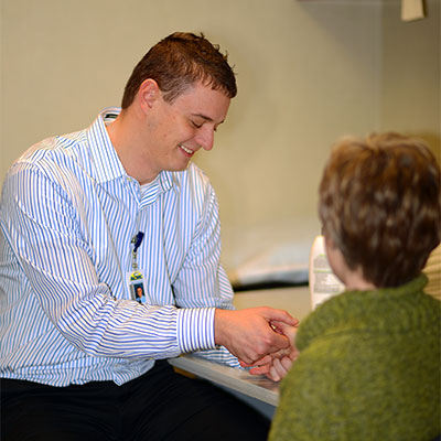 doctor working with patient