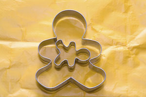 Gingerbread cookie cutter with a smaller cookie cutter in the middle.