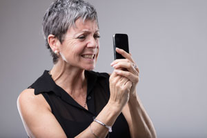 woman looking at phone