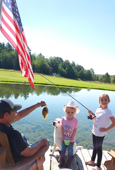 Doug fishing with granddaughters